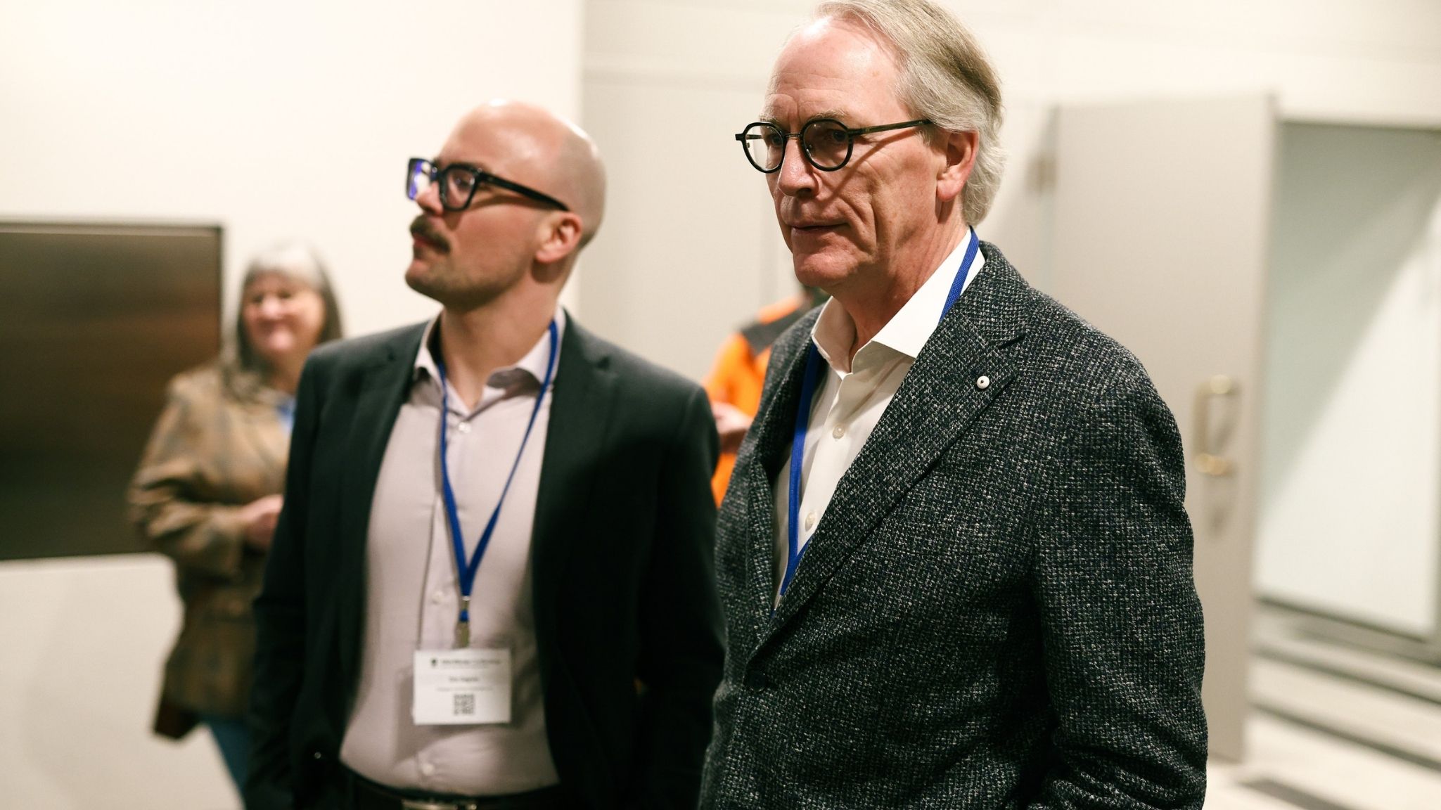 Eric Gagnon speaking with an attendee during the conference.